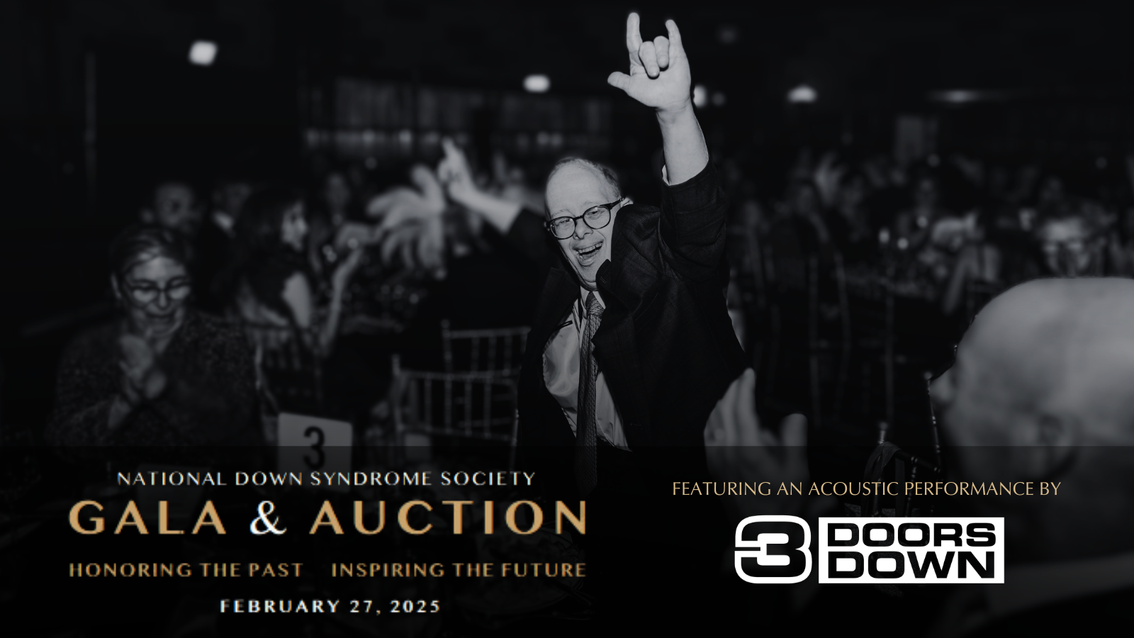 Image of bald man with Down syndrome dancing at the NDSS gala with his hands in the air, signing "I love you" in American Sign Language. National Down Syndrome Society Gala & Auction