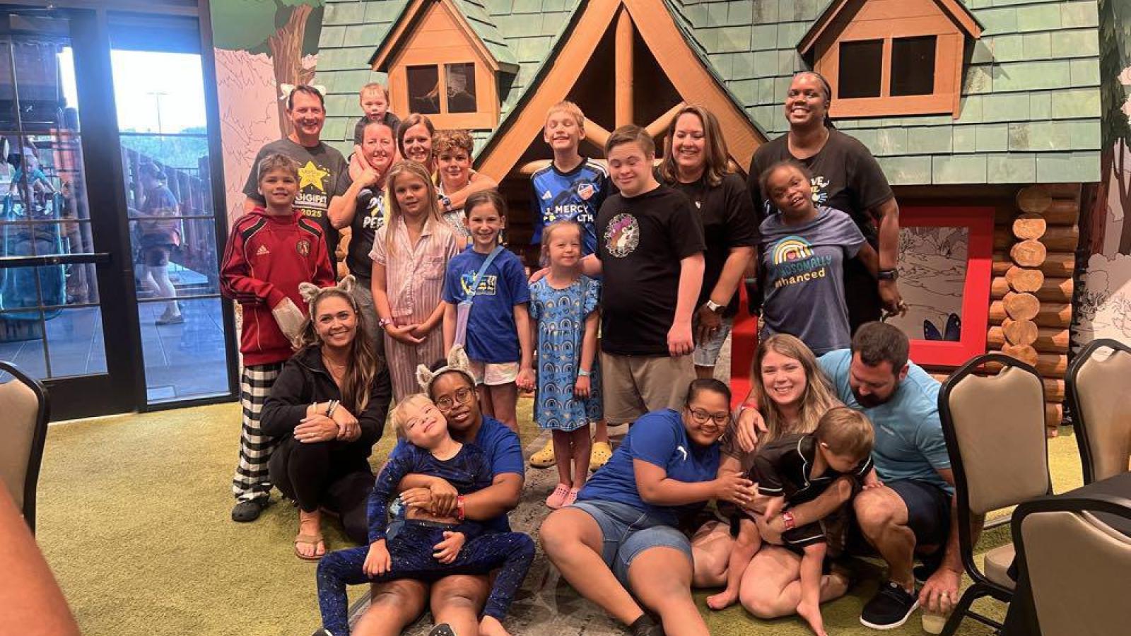 Group of individuals pose together at Family Weekend 2025