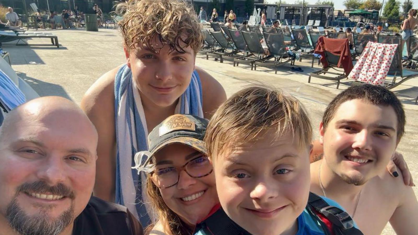 Family of five poses together at Family Weekend 2025