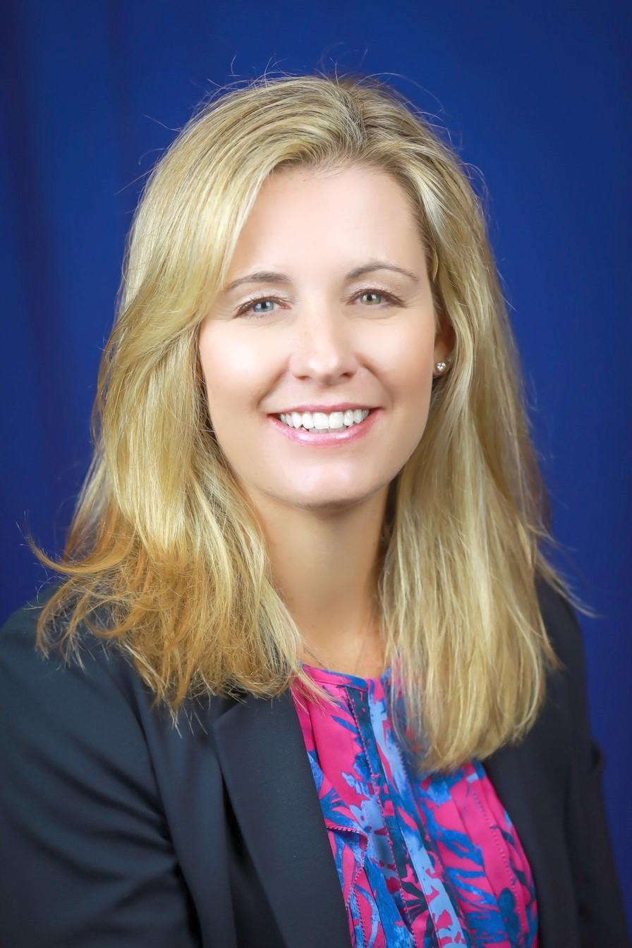 blonde woman smiled at camera for headshot