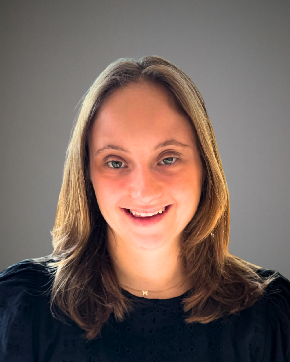 Headshot of Madison Essig, a woman with Down syndrome