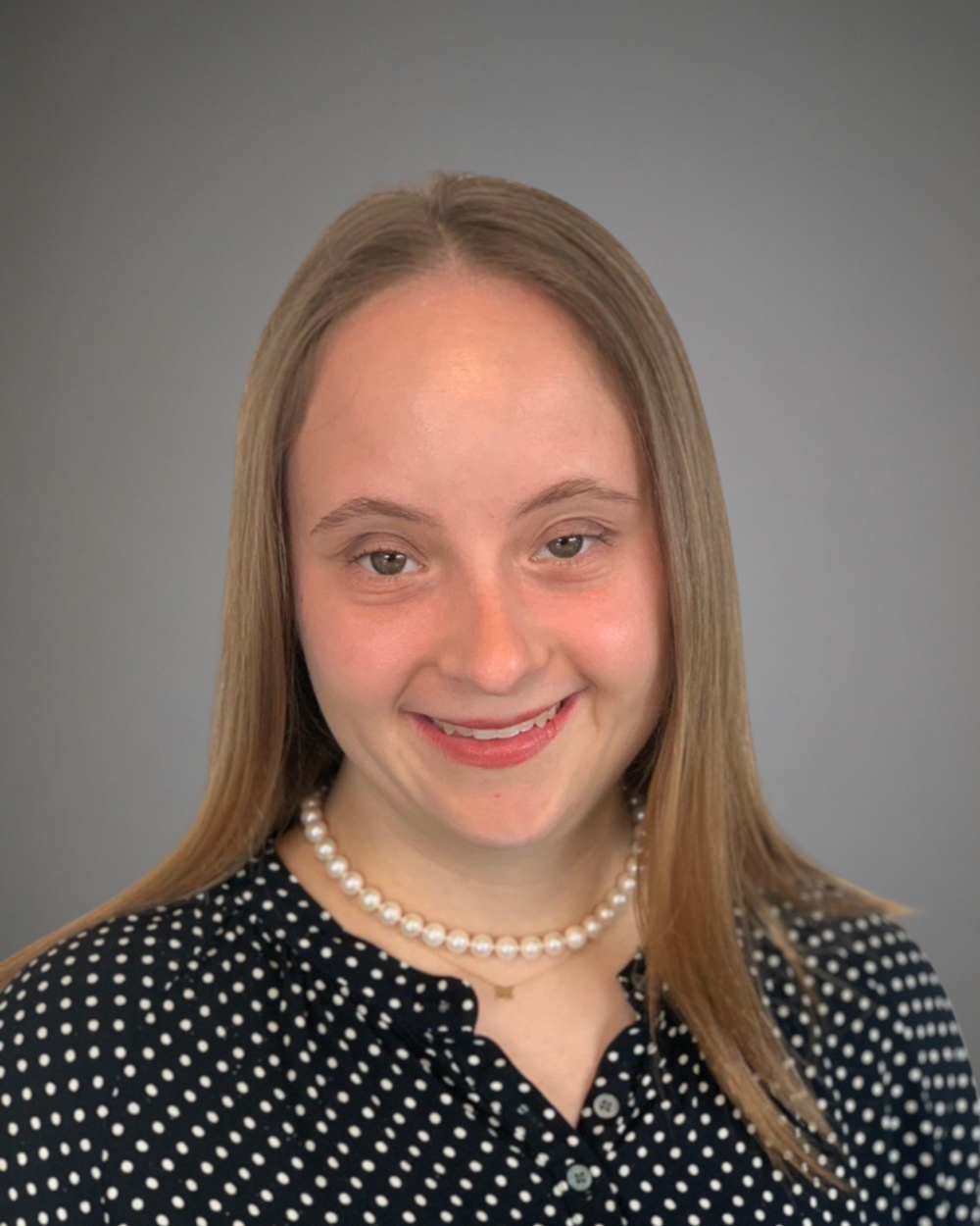 Headshot of Madison Essig, a woman with Down syndrome