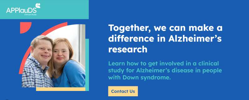 The APPlauDS Clinical Study logo, featuring a teal background with a white heart-shaped icon split into four rounded quadrants. A man and woman with Down syndrome smile closely together indoors; the man wears a blue and white checkered button-down shirt, and the woman wears a blue top. Text reads: Together, we can make a difference in Alzheimer's research. Learn how to get involved in a clinical study for Alzheimer's disease in people with Down syndrome. Contact Us.