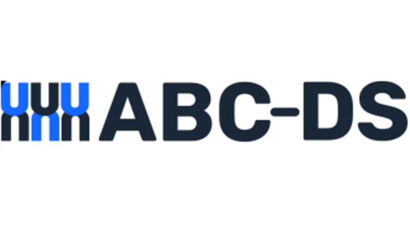 ABC-DS logo with a graphic of three blue and black chromosomes