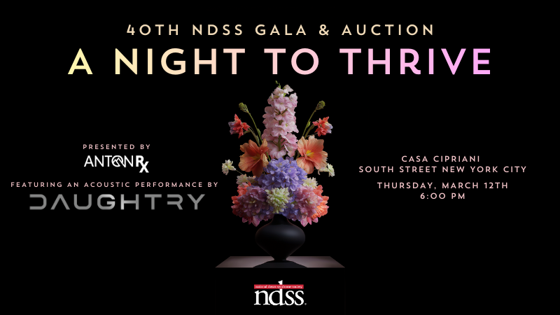 A Night to Thrive. Image of a vase with colorful flowers