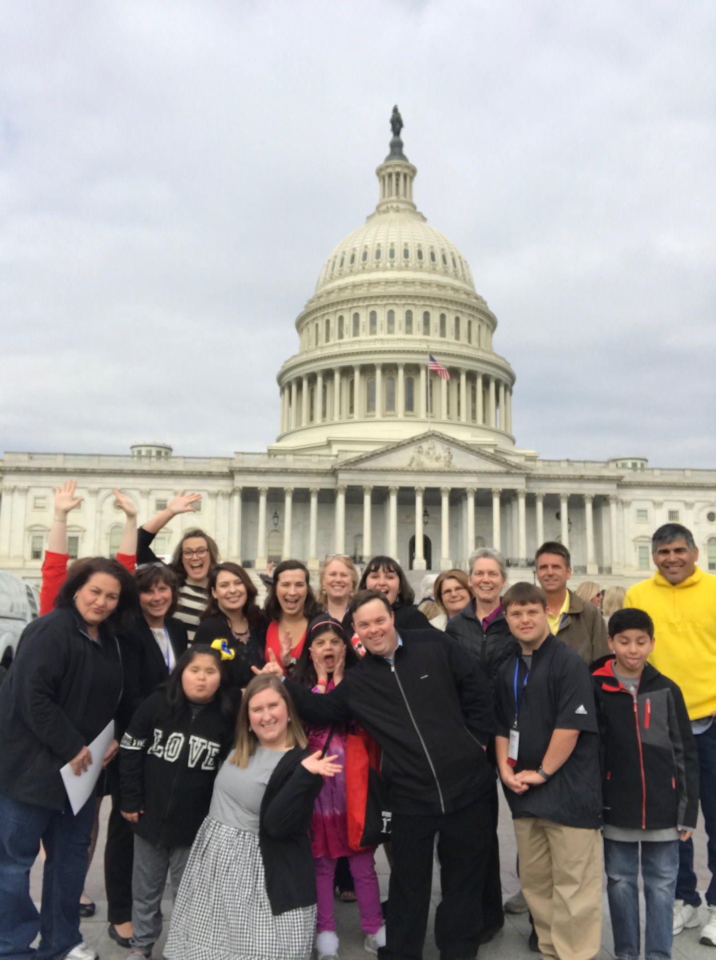 Group celebrating in front of the US Capitol Building