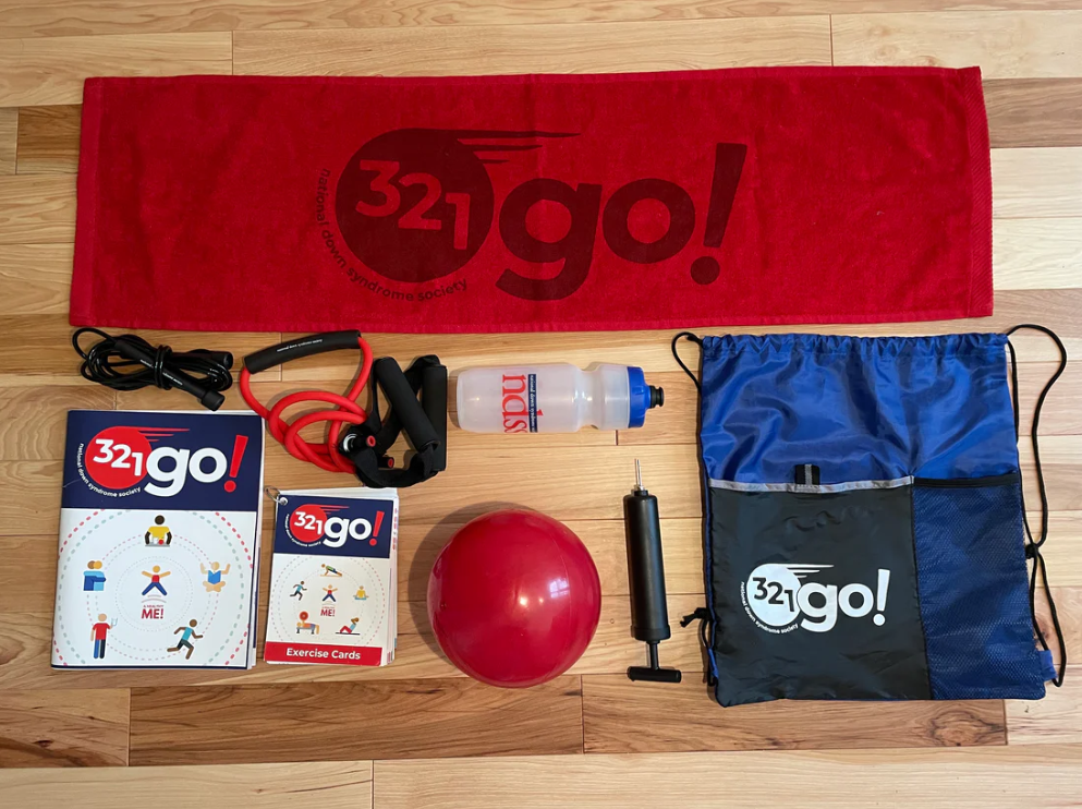321go! Fitness Kit with guides, a ball and pump, a drawstring bag, a towel, workout bands, and a water bottle