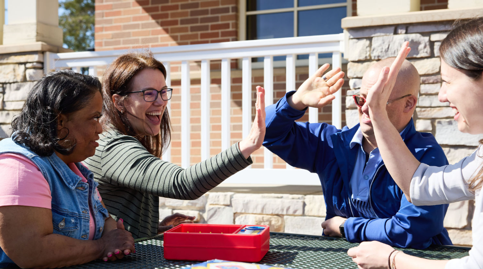 Friends playing a board game