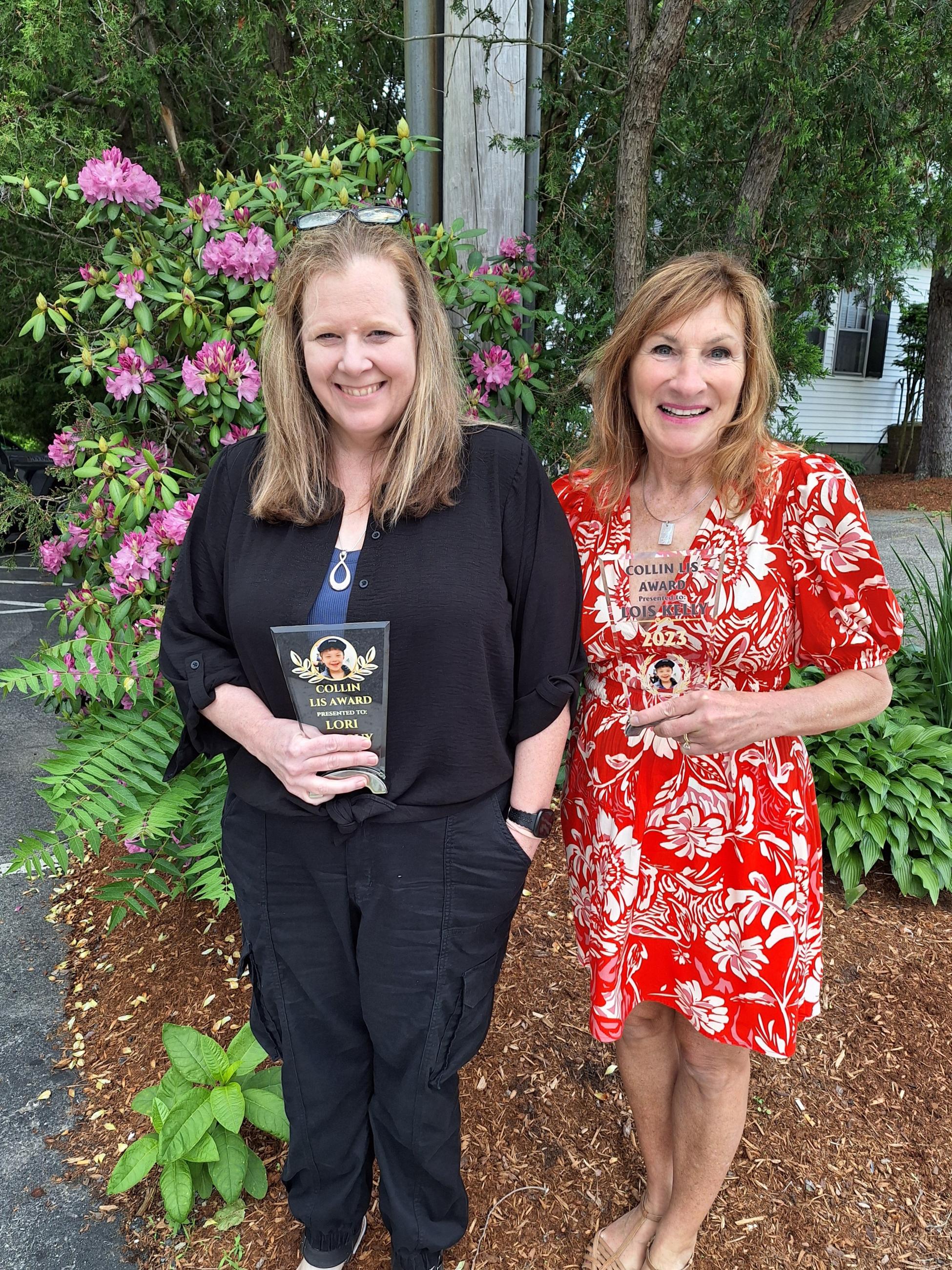 Lori Ostiguy (left) and Lois Kelly (right) receive the Colin Lis Humanitarian Award honoring an employee or volunteer of a Down syndrome organization whose acts of kindness have helped make a difference in the world.