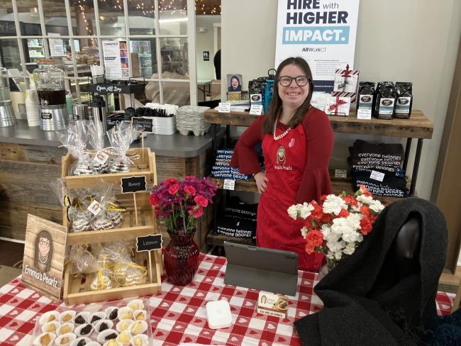 Emma at her Emma's Pearlz business stand