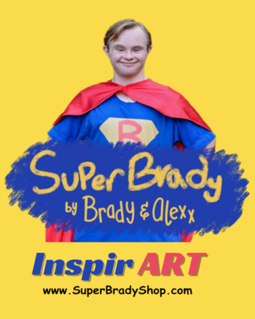Graphic on a yellow background of a smiling young man with Down syndrome and light brown hair, with his hands on his hips. He wears a red superhero cape and a blue T-shirt with a tan shield bearing a pink letter. A blue brushstroke banner across the image reads “Super Brady by Brady & Alexx” in yellow letters. Below it, the words “Inspir Art” appear in blue and pink, followed by “www.SuperBradyShop.com” in black.