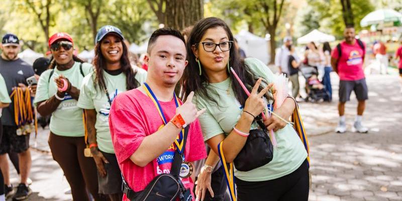 Two people posing at the NYC Buddy Walk